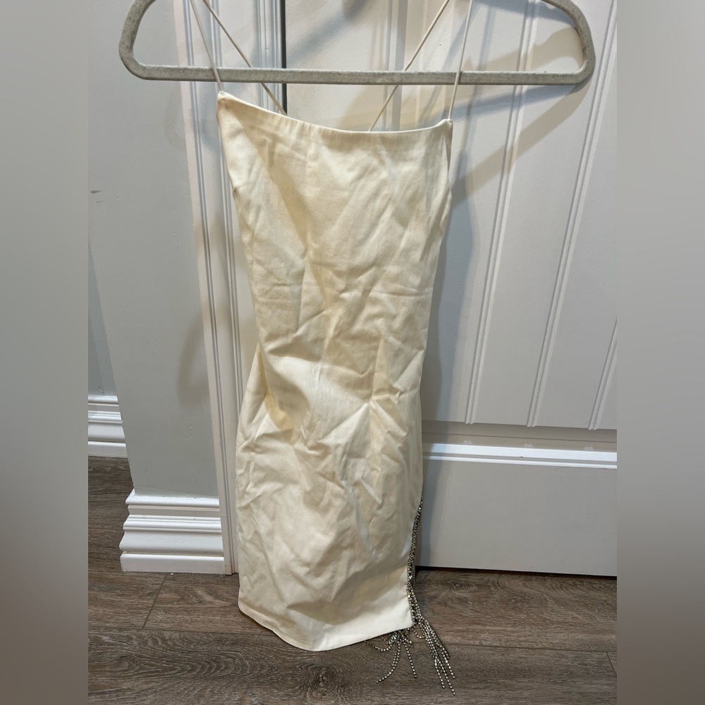 white body con dress with diamond drips on side